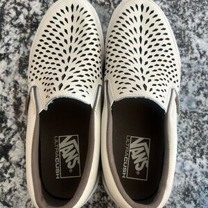 Vans White Perforated Slip-On Sneakers